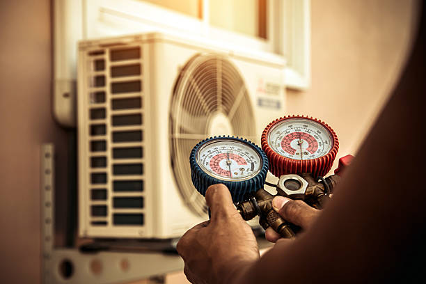 Professional Heat Pump Repair technician working in Salem, MA